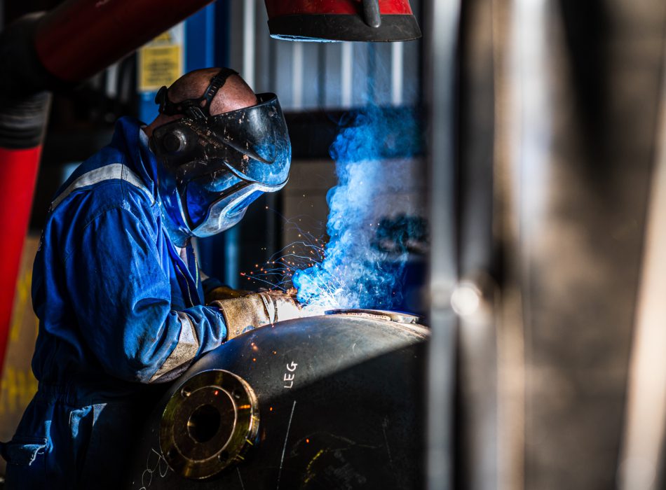 Puma Engineer welding a hatch