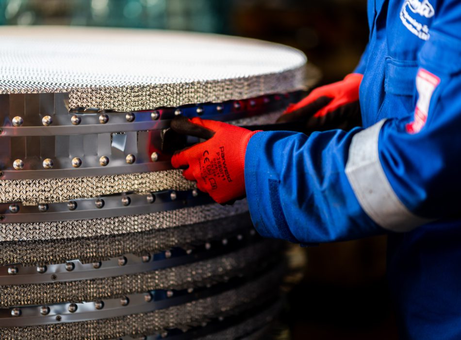 A Puma Engineer tends to a metal drum