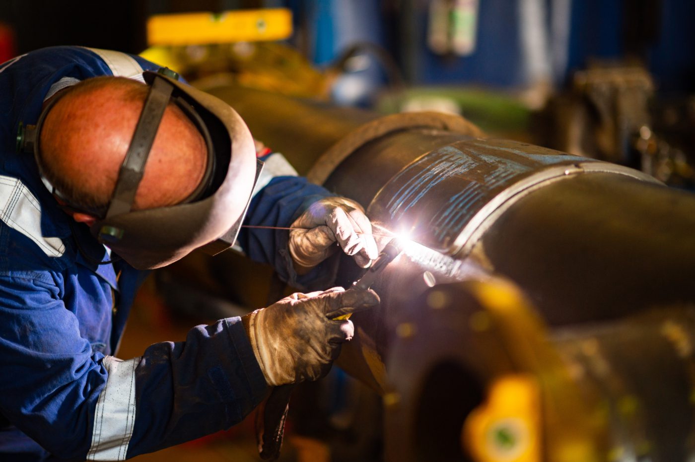 Puma Engineer welds a metal hatch closed