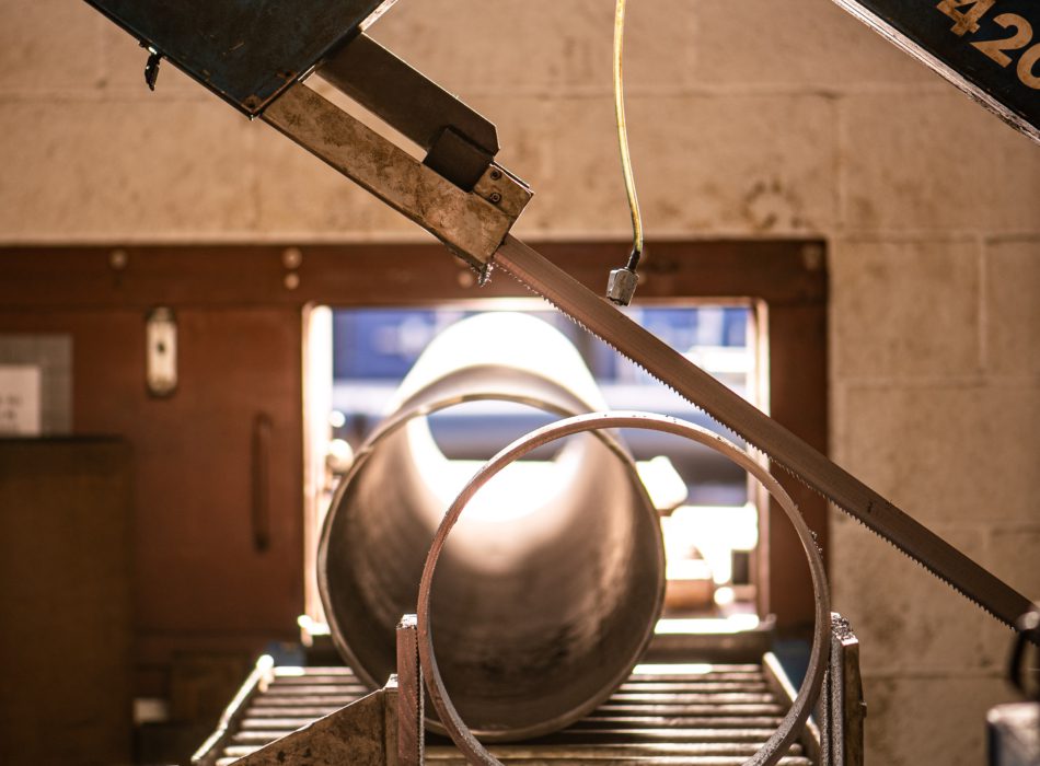 Pipe on a conveyer belt